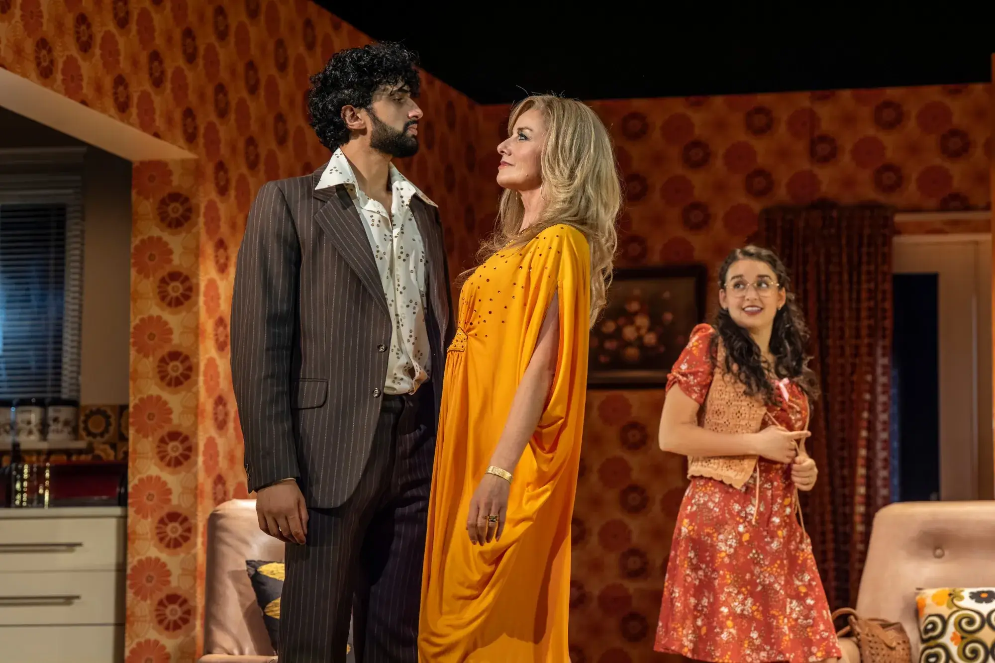 Omar Malik as Tony, Tamzin Outhwaite as Beverly and Lauren Patel as Angela in Abigail's Party at the Harold Pinter Theatre - photography by Mark Senior