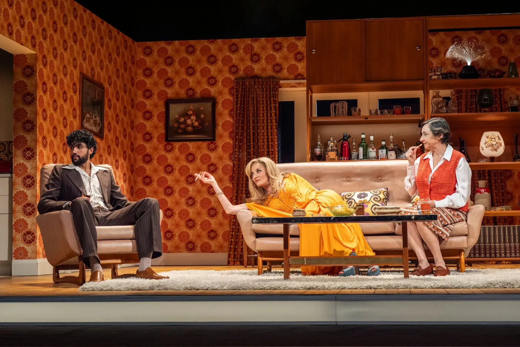 Omar Malik as Tony, Tamzin Outhwaite as Beverly and Pandora Colin as Sue in Abigail's Party at the Harold Pinter Theatre - photography by Mark Senior