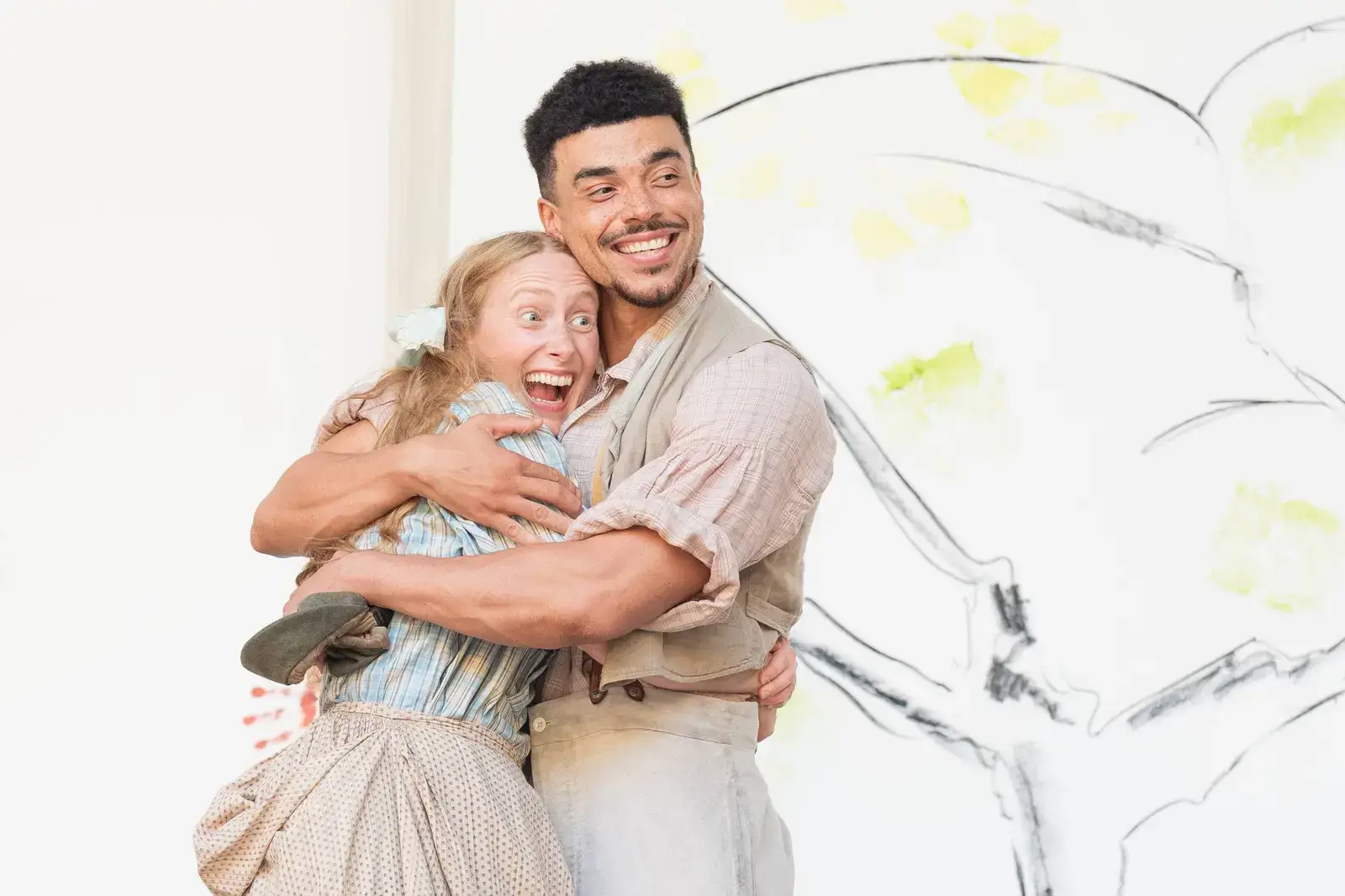 A joyful couple in rustic Arden costume
