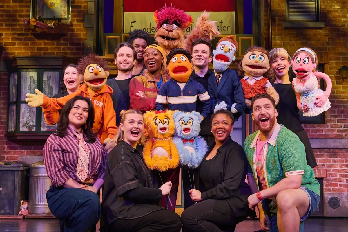 The full company of Avenue Q with all their puppets at the Shaftesbury Theatre, London