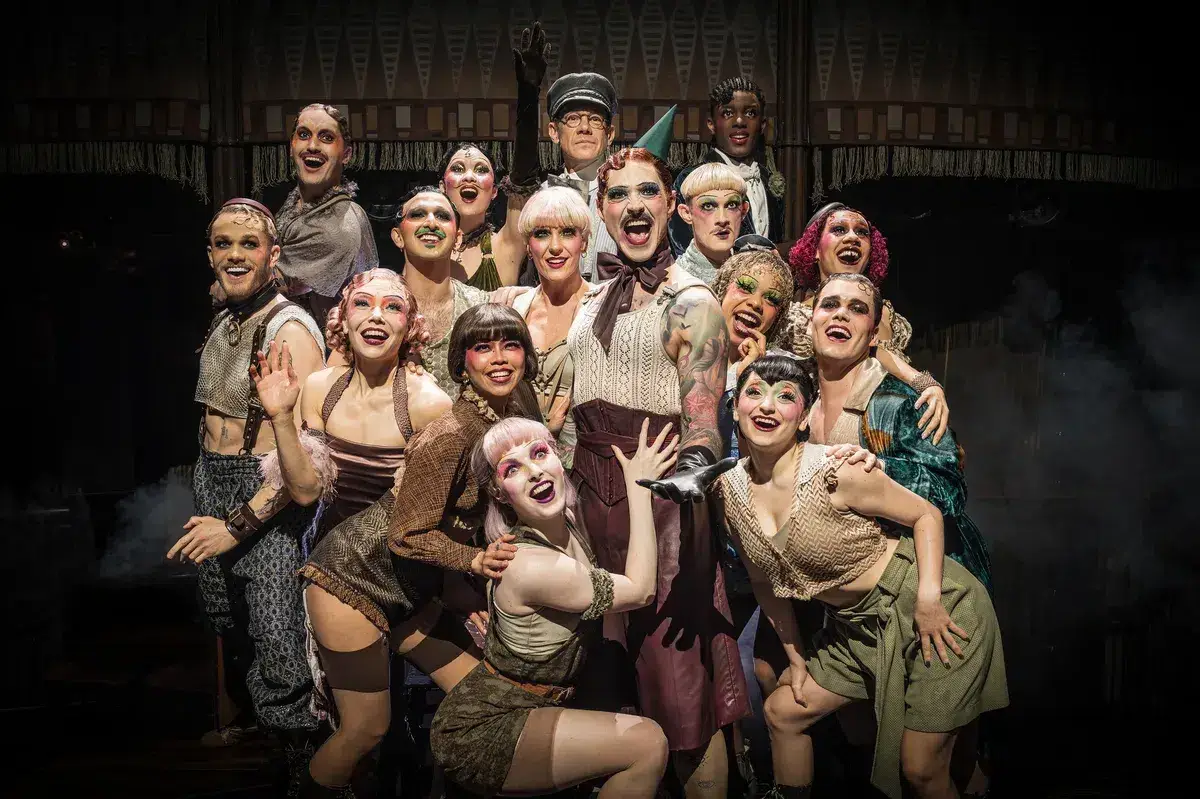 The Emcee and the Kit Kat Club company