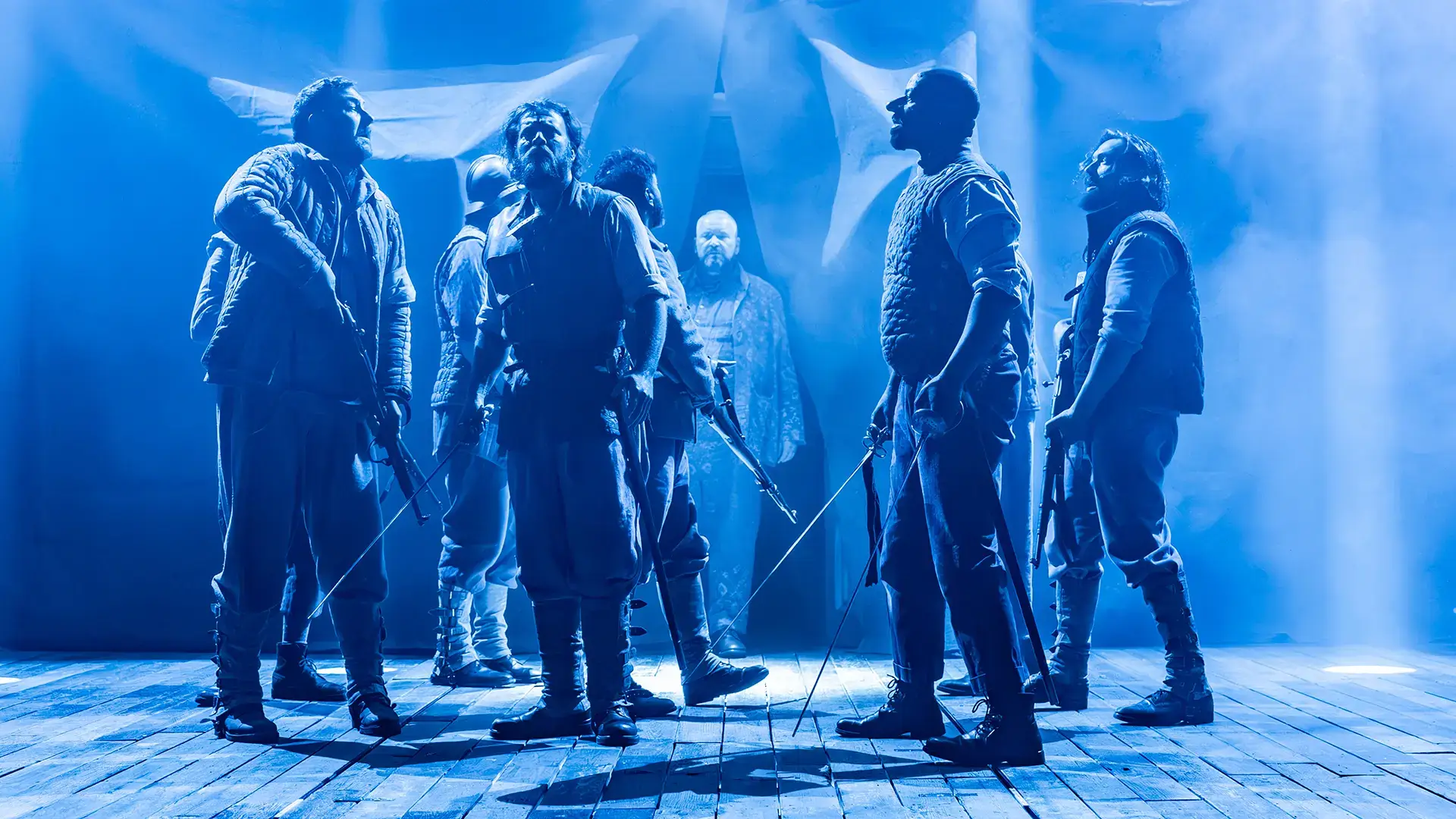 The company in a sword-drawn standoff in Cyrano de Bergerac at the Noël Coward Theatre - photography by Marc Brenner