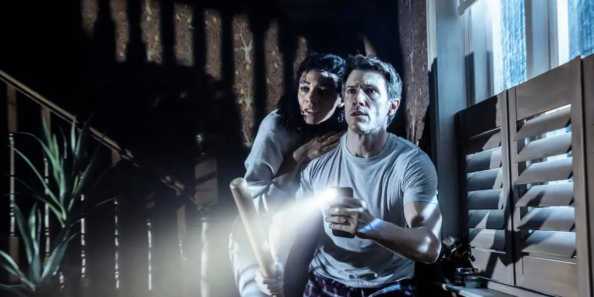 Melissa James as Lou and Patrick Heusinger as James in Paranormal Activity