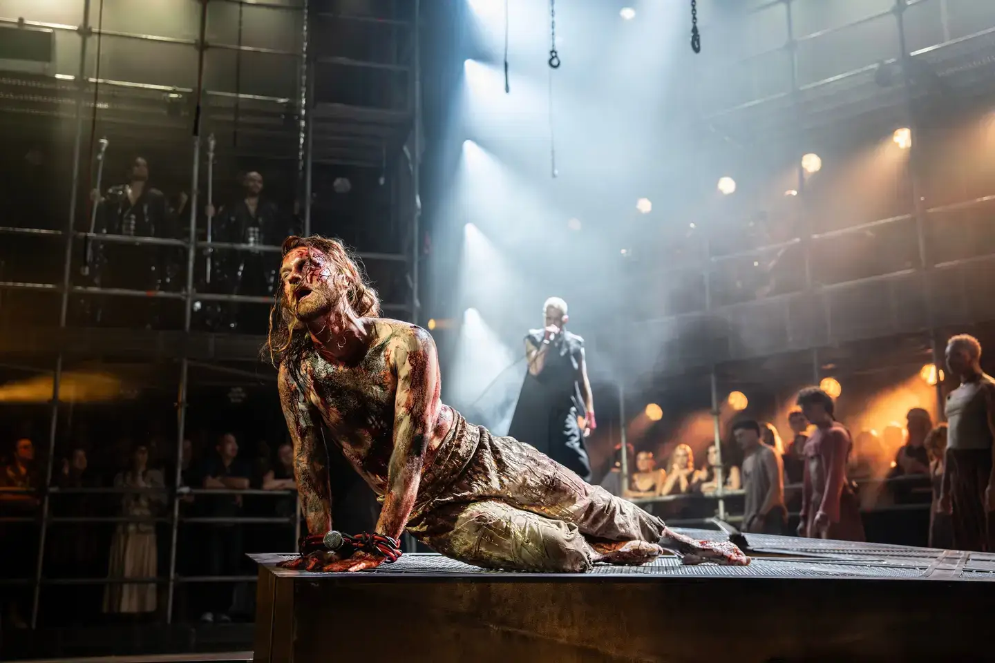 Sam Ryder as Jesus, centre stage
