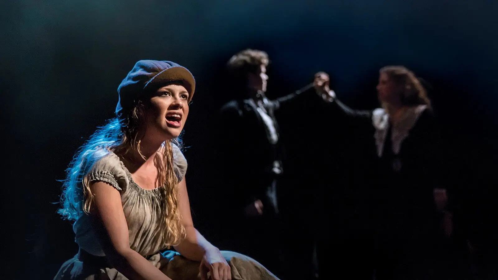 The company of Les Misérables on stage