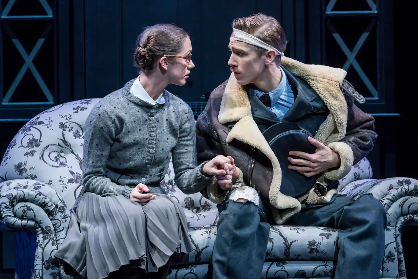 Cinderella and Harry in a Blitz-era embrace