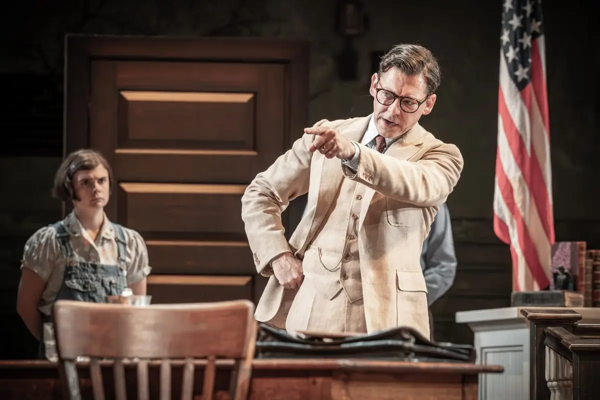Atticus Finch addressing the courtroom with Scout watching in To Kill a Mockingbird at Wyndham's Theatre, London