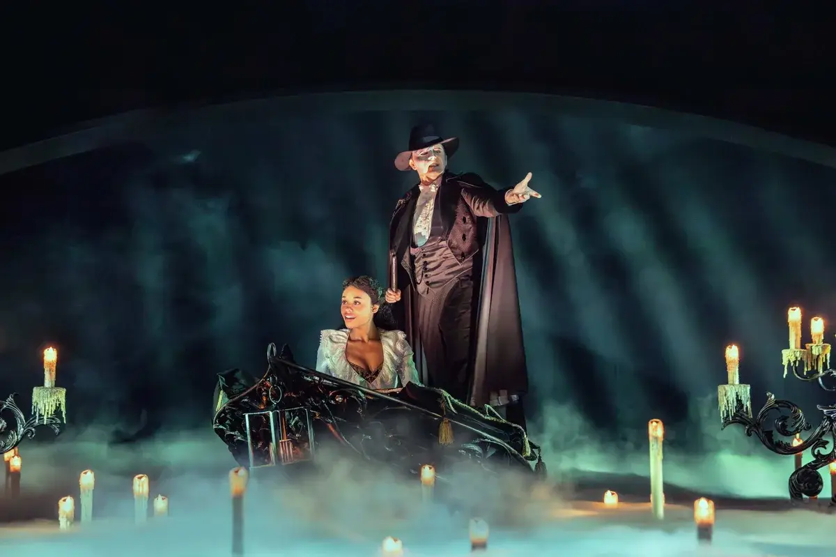 The Phantom and Christine on the underground lake