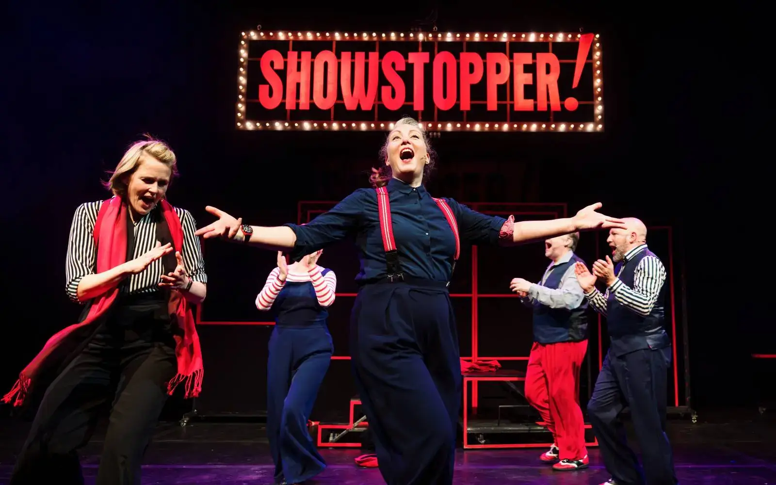 The company mid-number under the illuminated Showstopper sign