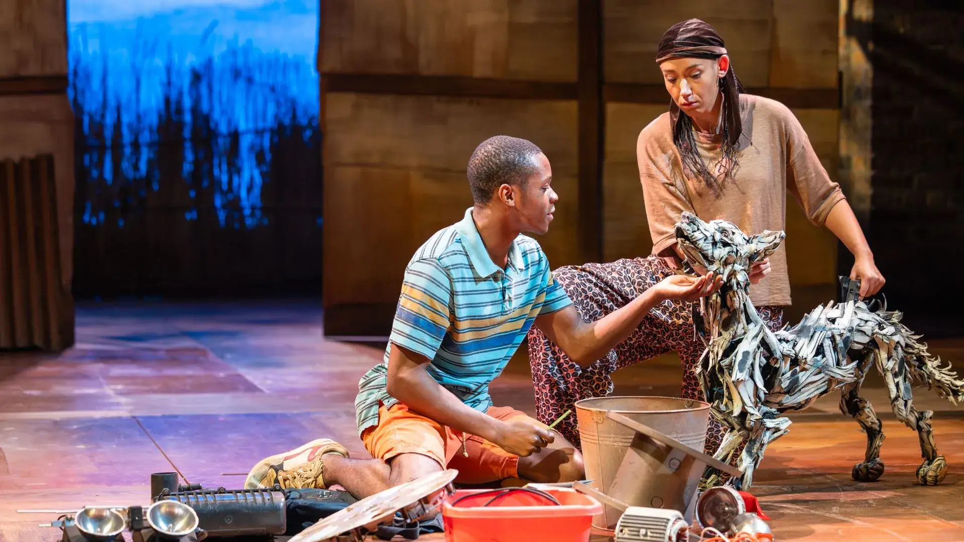 Alistair Nwachukwu as William with Khamba the dog puppet in The Boy Who Harnessed the Wind at @sohoplace - photography by Tyler Fayose