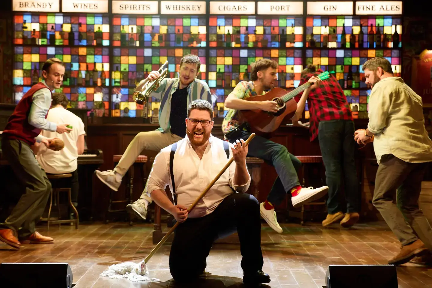 The comic mop-and-broom routine