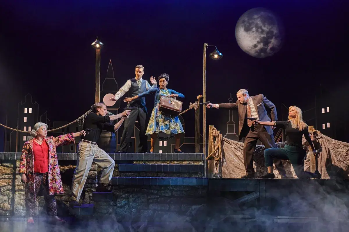 The cast on the moonlit bridge scene in The Comedy About Spies - photography by Matt Crockett & Mark Senior